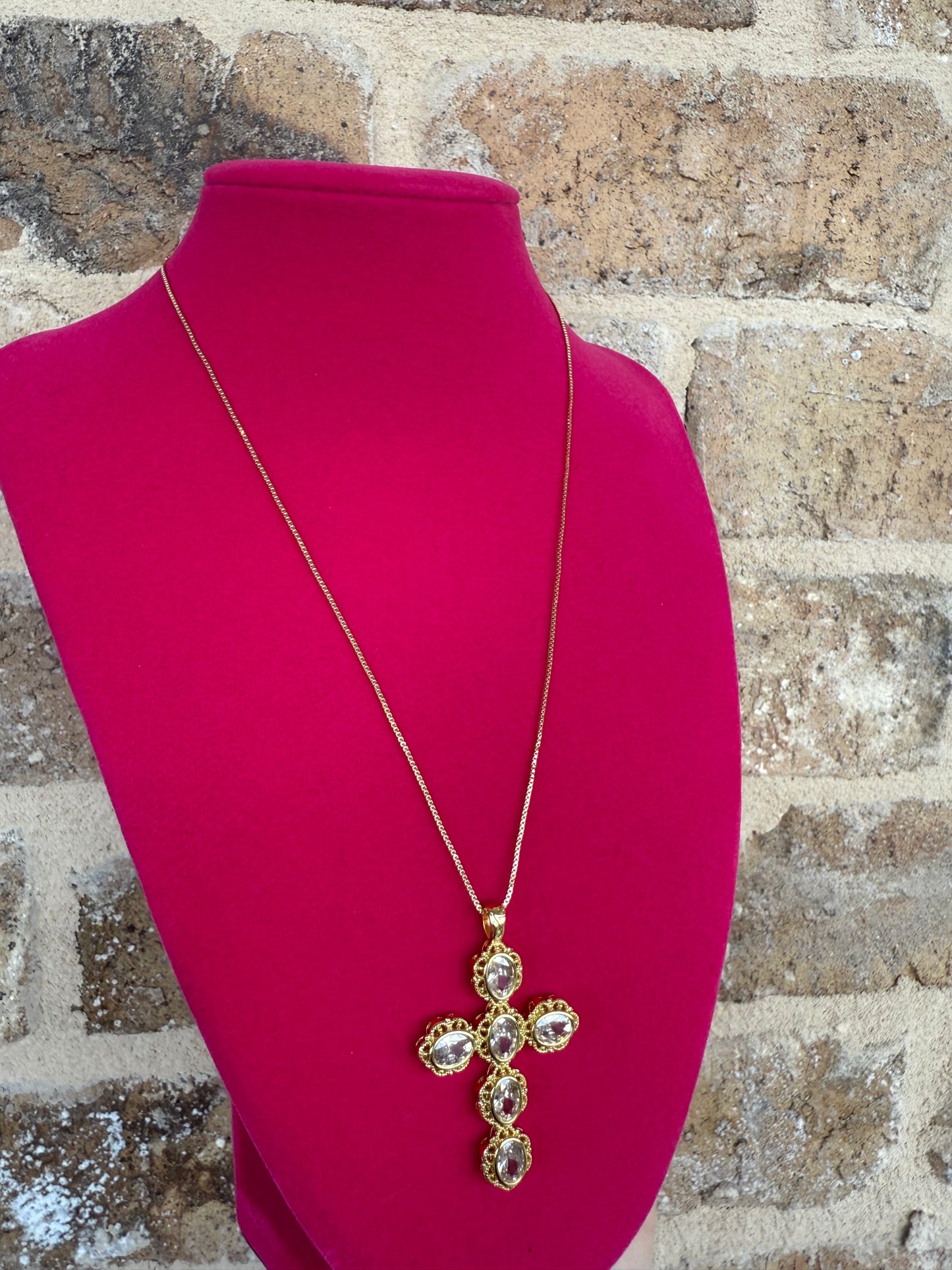 FLOWERED CROSS NECKLACE