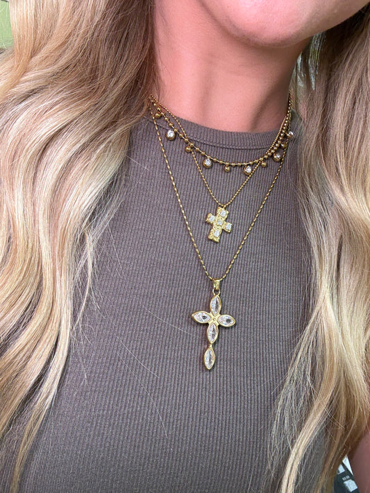 CLEAR STONE OVAL MEDIUM LENGTH CROSS